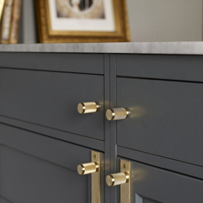 buster & punch solid brass cabinet knobs on dark cabinetry